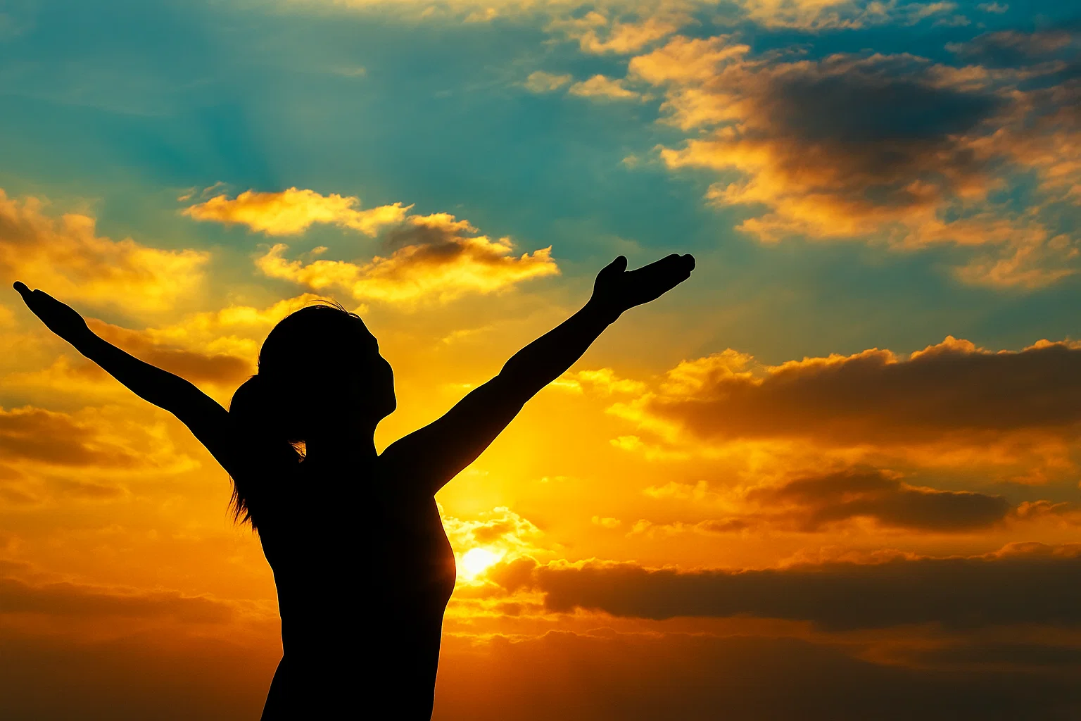 Woman celebrating transformation at sunrise